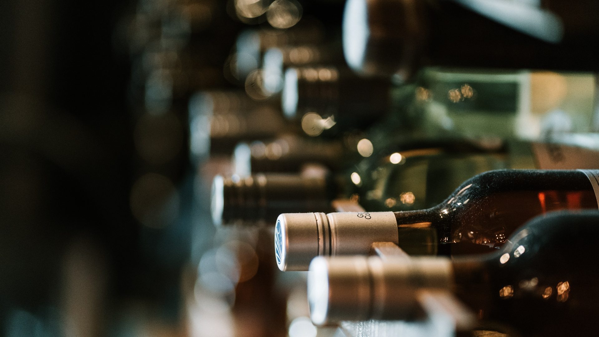 bottles of Portuguese wines stacked up